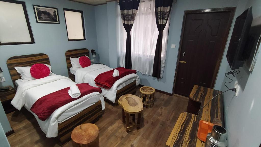 Postel nebo postele na pokoji v ubytování SVR INN