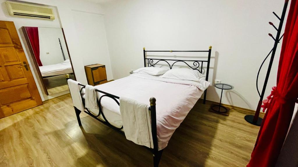 Postel nebo postele na pokoji v ubytování Hotel Drinos