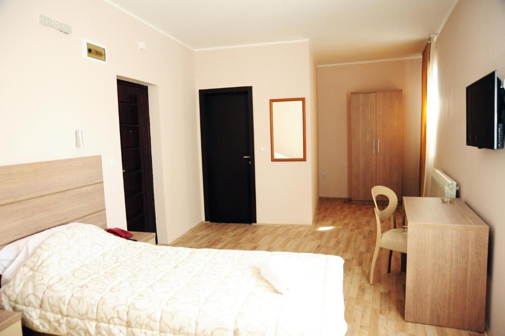 TV a/nebo společenská místnost v ubytování Garni Hotel Crystal Ice