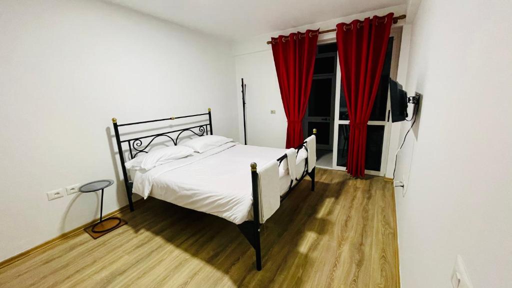 Postel nebo postele na pokoji v ubytování Hotel Drinos