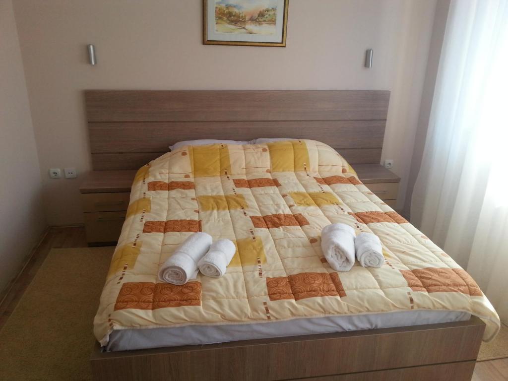 Postel nebo postele na pokoji v ubytování Garni Hotel Crystal Ice