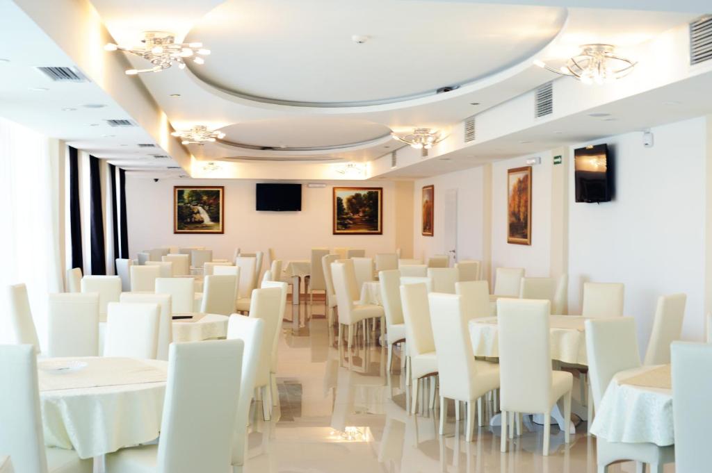 TV a/nebo společenská místnost v ubytování Garni Hotel Crystal Ice