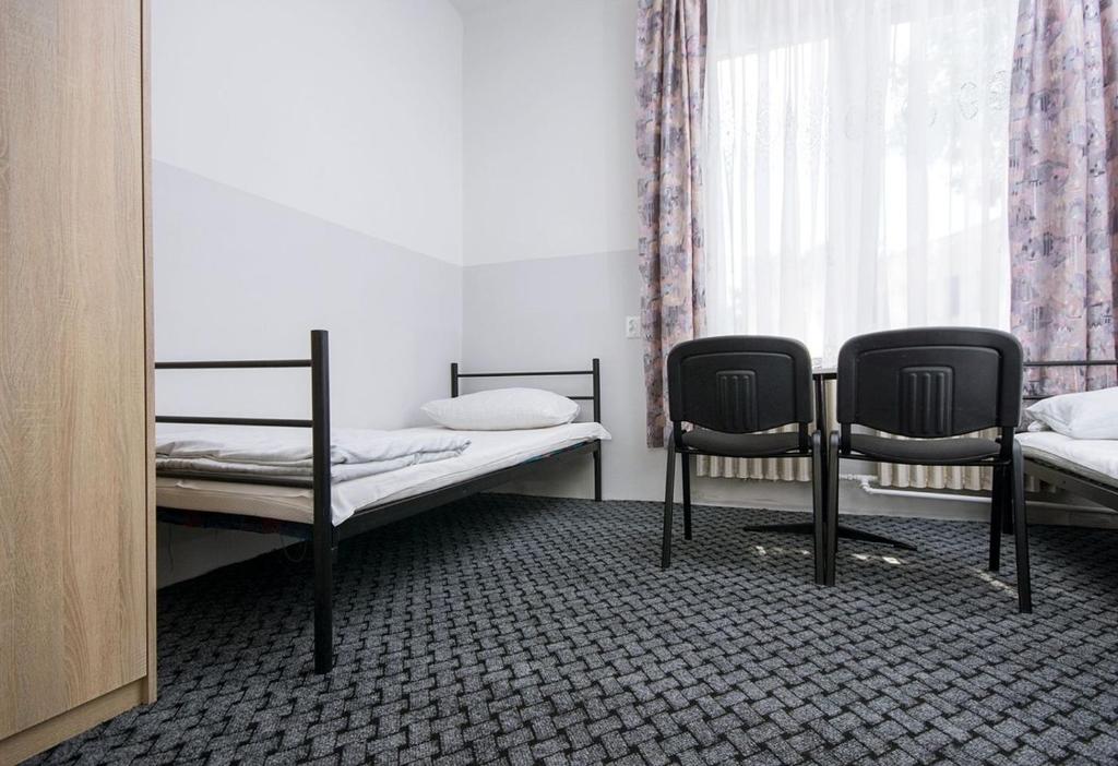 Postel nebo postele na pokoji v ubytování Noclegi PODZAMCZE PTTK