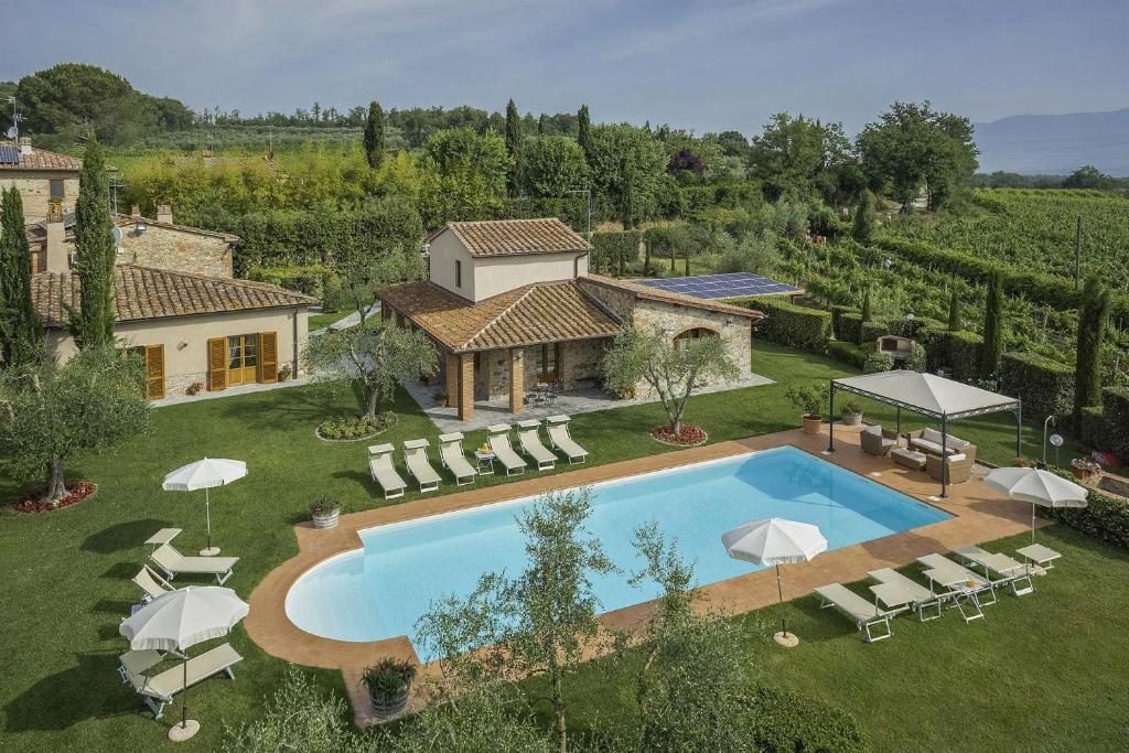 an aerial view of a villa with a swimming pool at Villa di Capannole 12 in Bucine