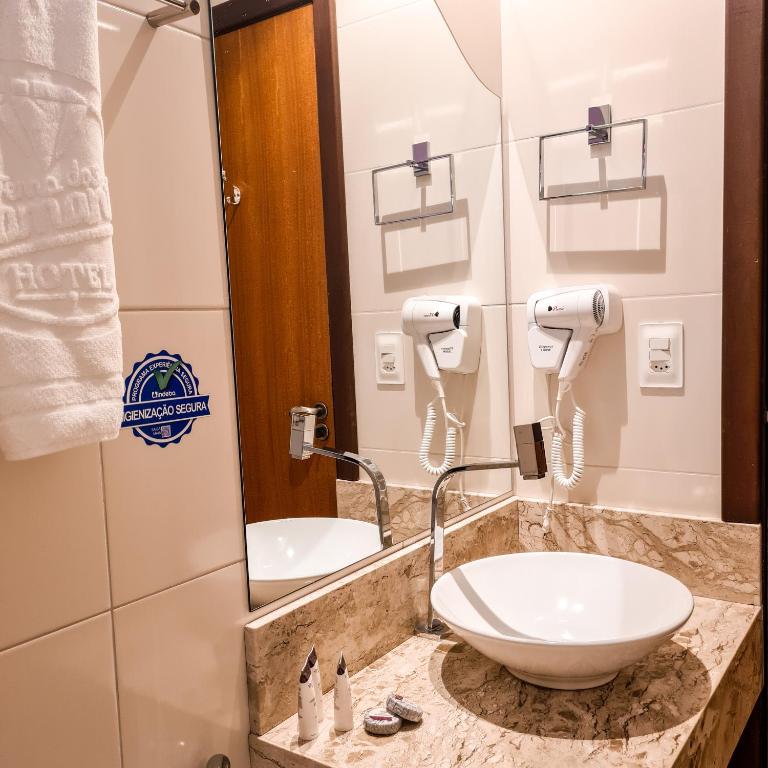 Um banheiro em Terra dos Diamantes Hotel