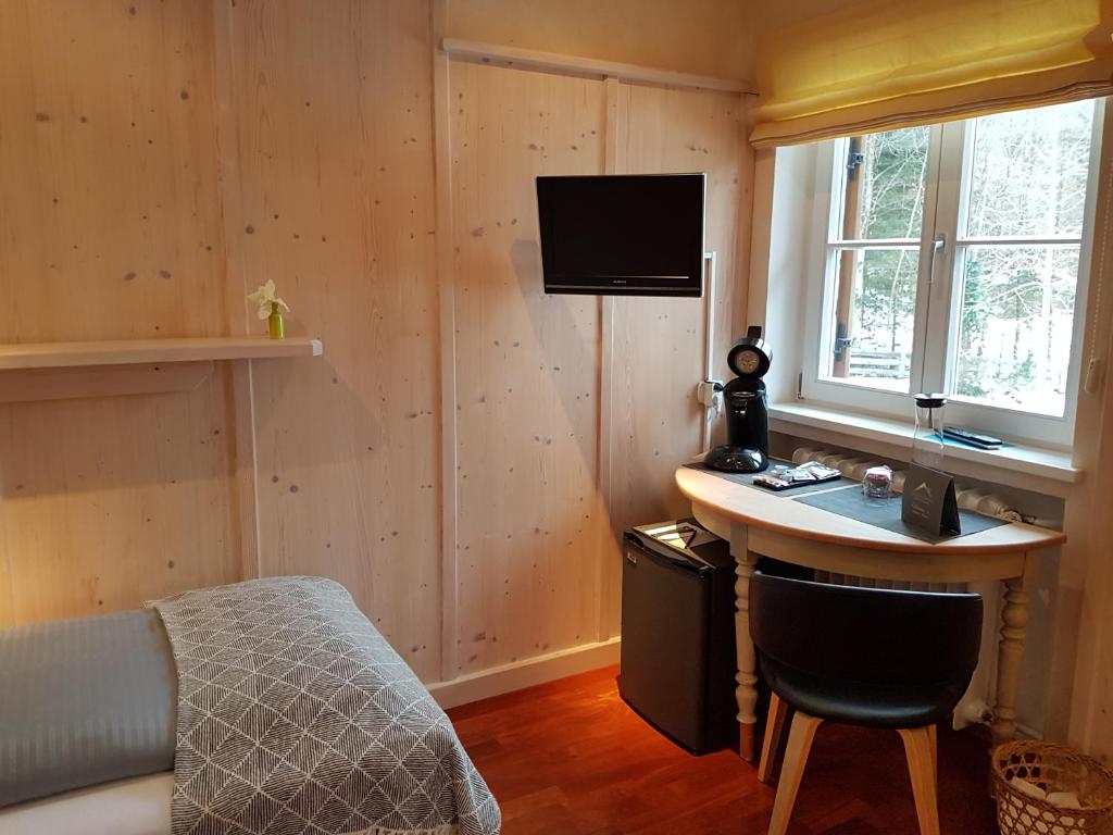 TV a/nebo společenská místnost v ubytování Kaiser's Landhaus