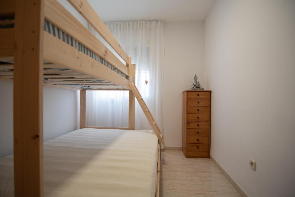 Posteľ alebo postele v izbe v ubytovaní Casa Riu Avall
