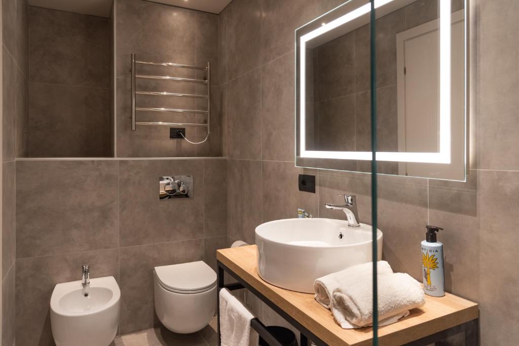 Koupelna v ubytování Modica Boutique Hotel