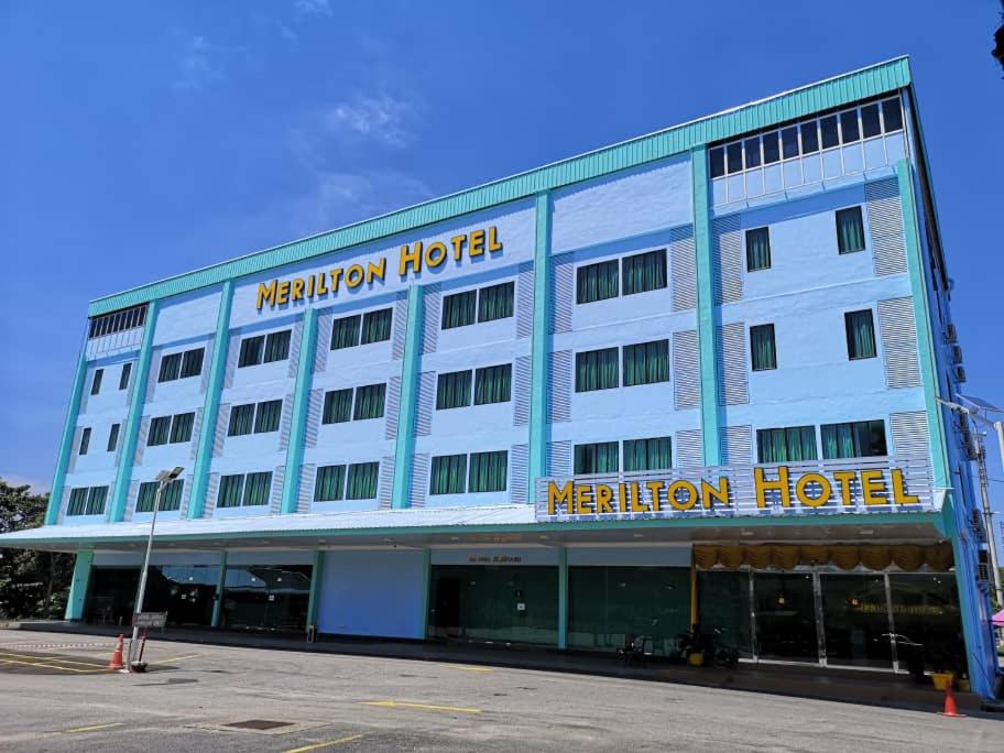 a hotel building with a sign that reads meridian hotel at Merilton Hotel in Sungai Petani