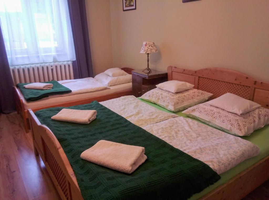 Posteľ alebo postele v izbe v ubytovaní Pod limbą