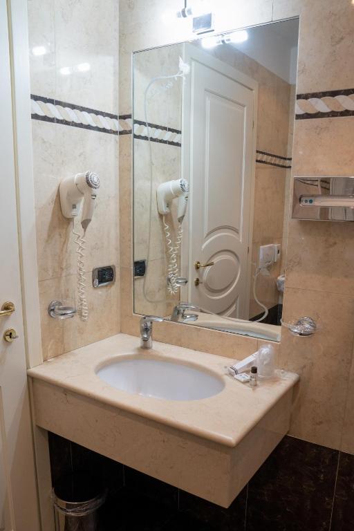 Koupelna v ubytování Hotel La Noce