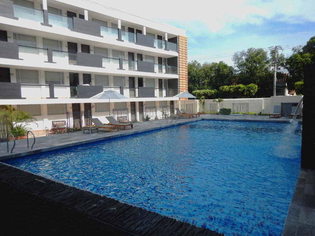 Bazén v ubytování Hotel CasaBlanca Cucuta nebo v jeho okolí