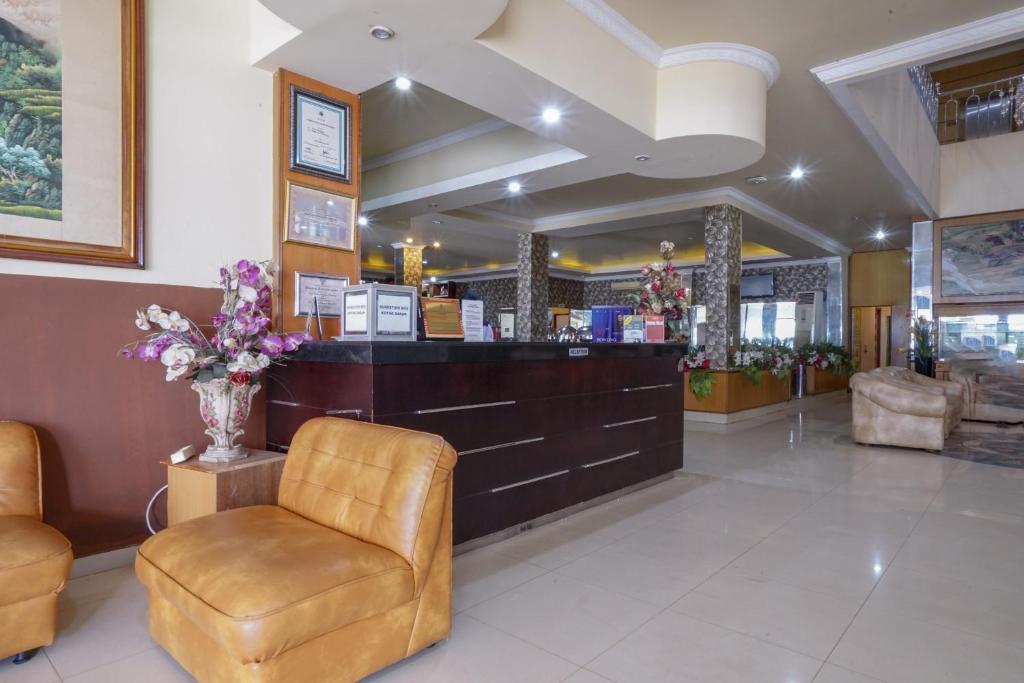 Capital O 2064 Kartika Sriwijaya Hotel