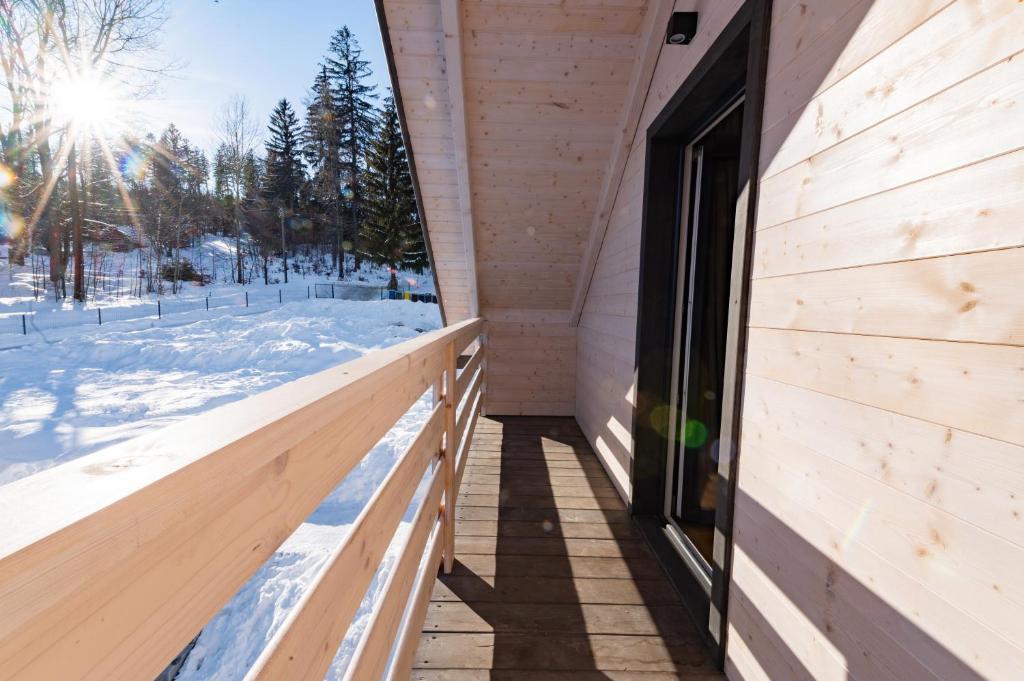 White Holiday Domki i Apartamenty v zime