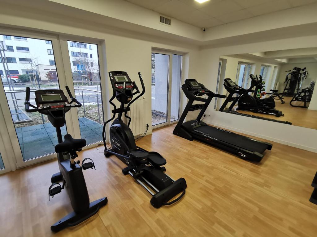 Posilňovňa alebo fitness centrum v ubytovaní Apartament Bałtycka