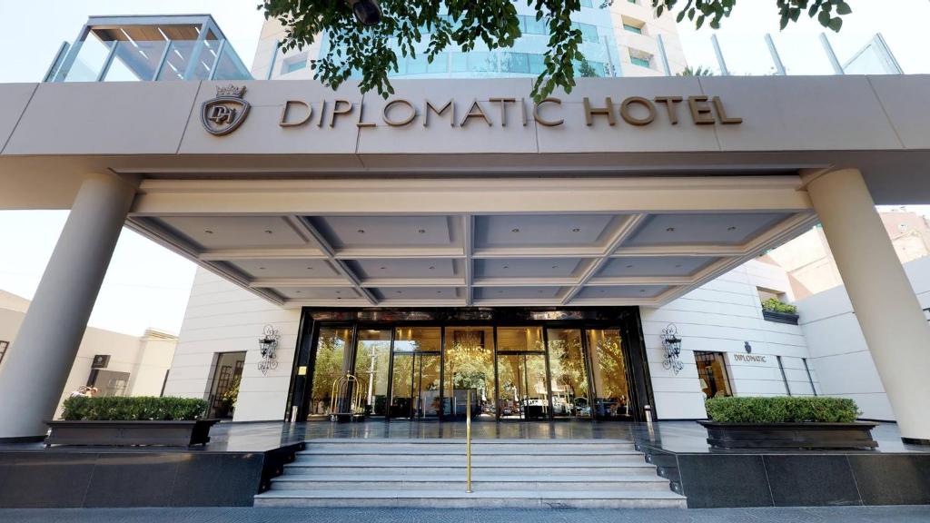 a building with the entrance to a dermatographical hotel at DiplomaticHotel in Mendoza