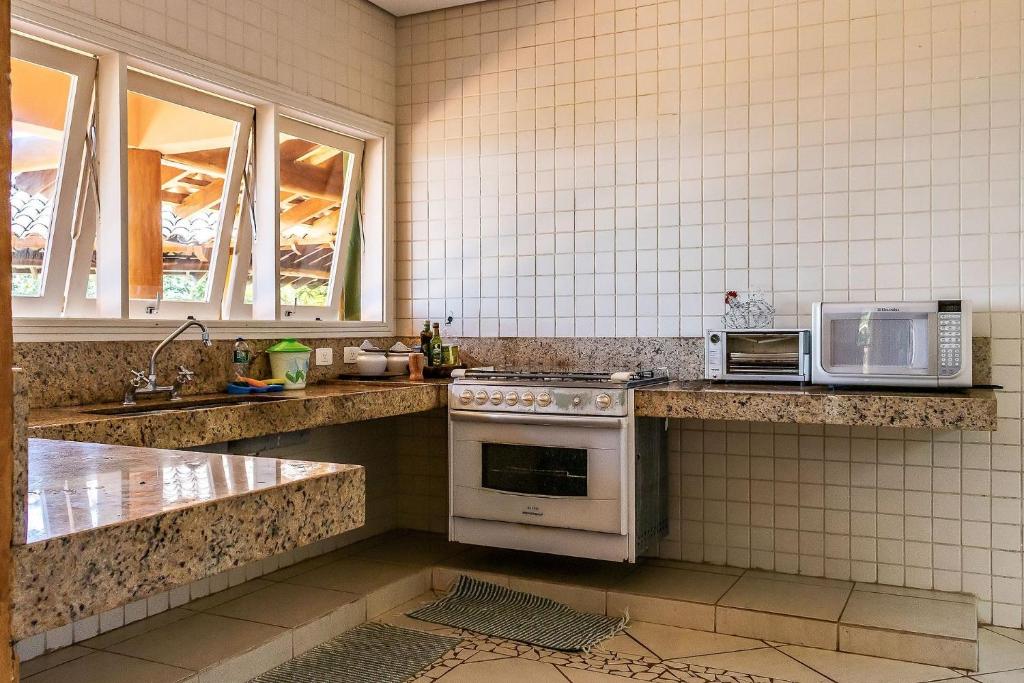 Mansão Sobreomar - Casa em condomínio de alto padrão na Ilhabela  Mansão Sobreomar - Casa em condomínio de alto padrão na Ilhabela