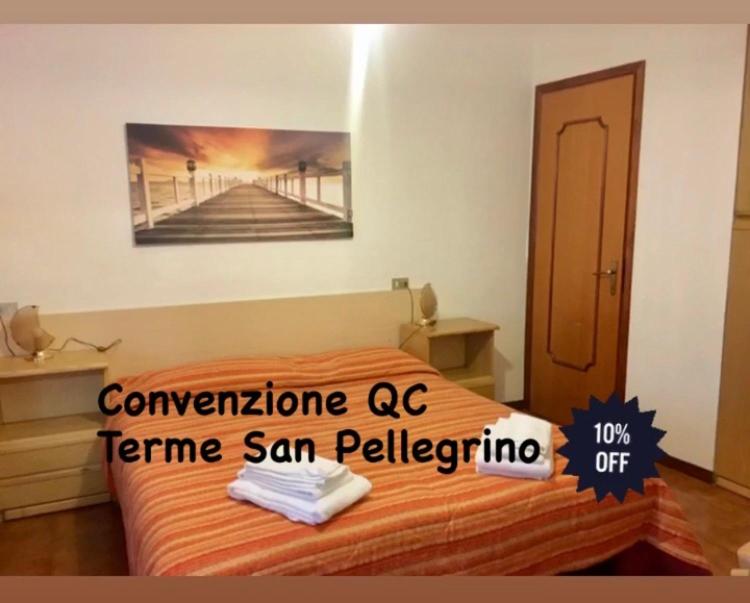 Łóżko lub łóżka w pokoju w obiekcie Hotel Americana
