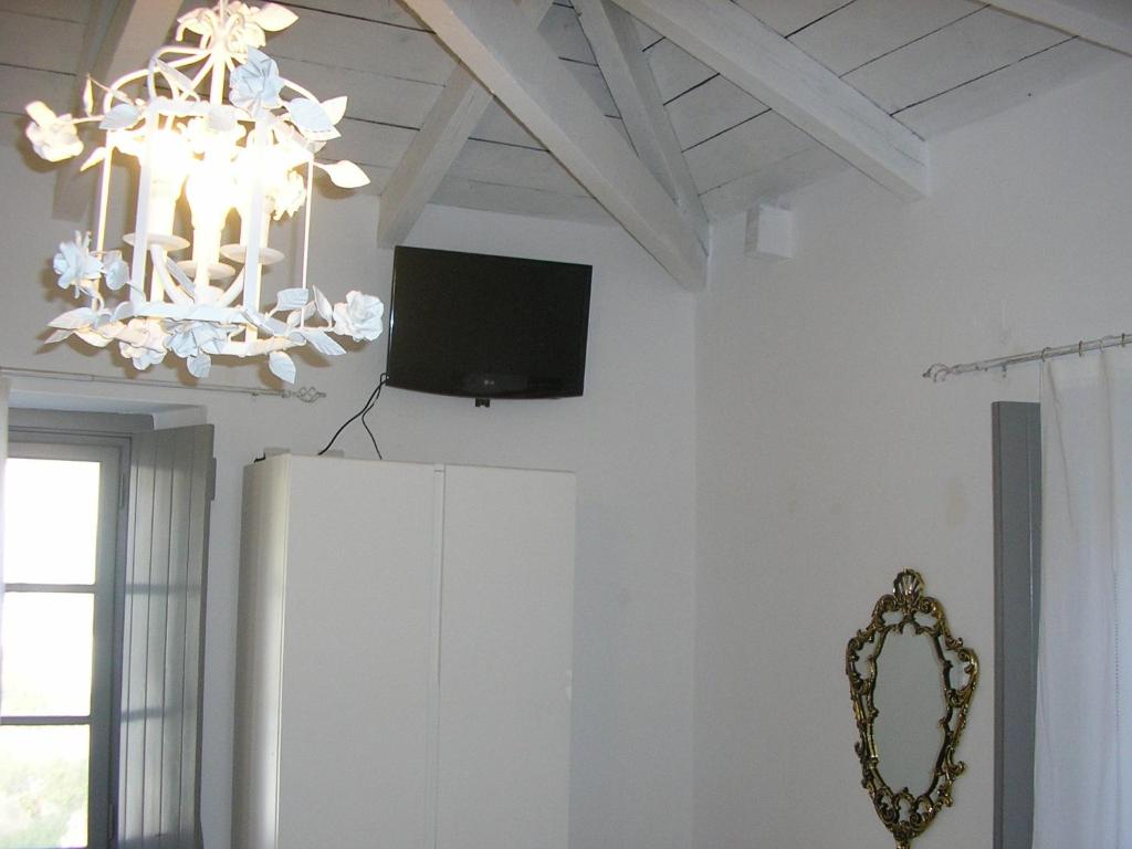 Telewizja i/lub zestaw kina domowego w obiekcie Villa Sunrise