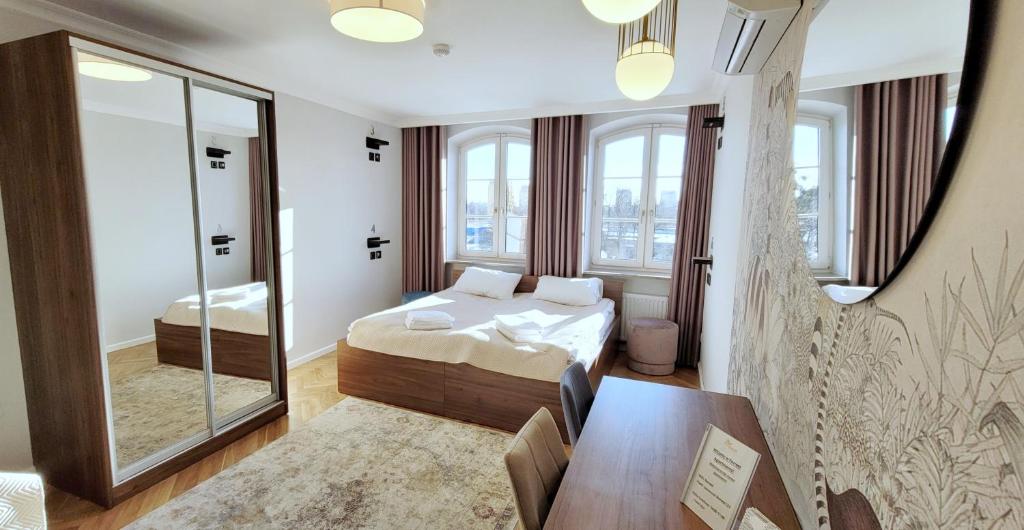 Postel nebo postele na pokoji v ubytování Forrest Apartments & Hostel