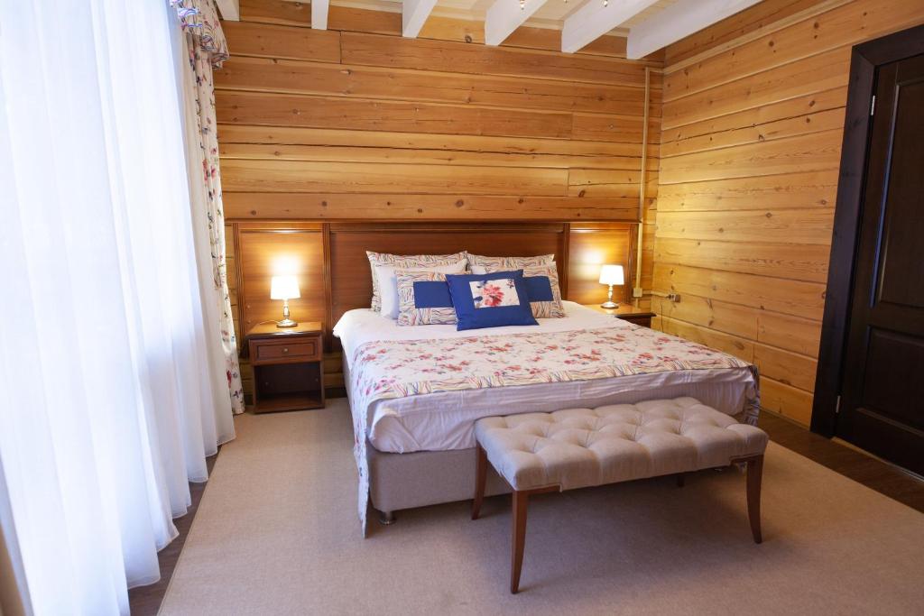 Ένα ή περισσότερα κρεβάτια σε δωμάτιο στο Baikalskaya Riviera Hotel