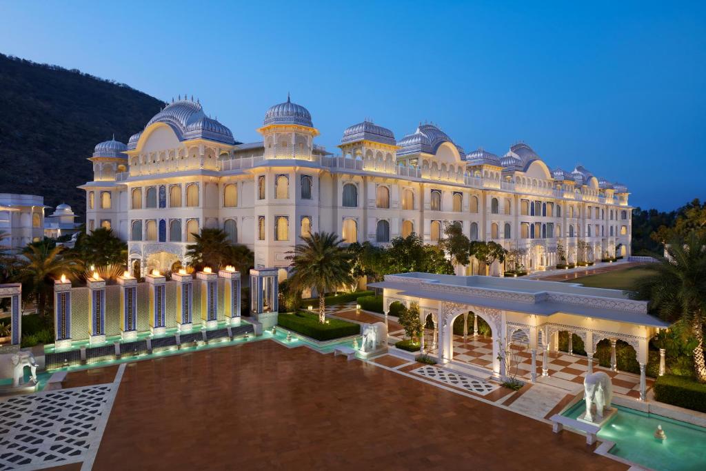 a rendering of a large building at night at The Leela Palace Jaipur in Jaipur