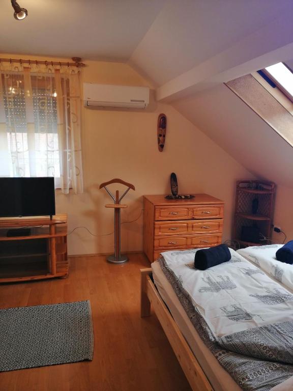 A television and/or entertainment centre at Elza Apartman
