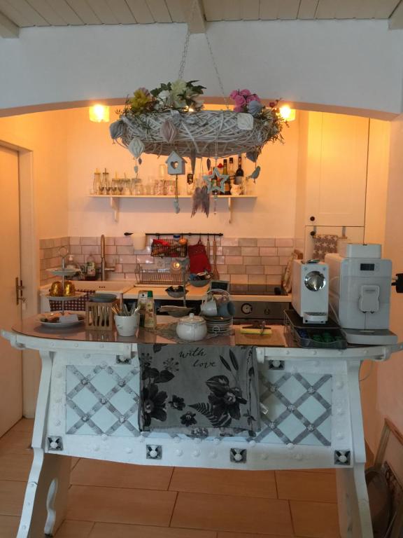 a kitchen with a large counter top in a room at Bed and Breakfast 57 in Asuel