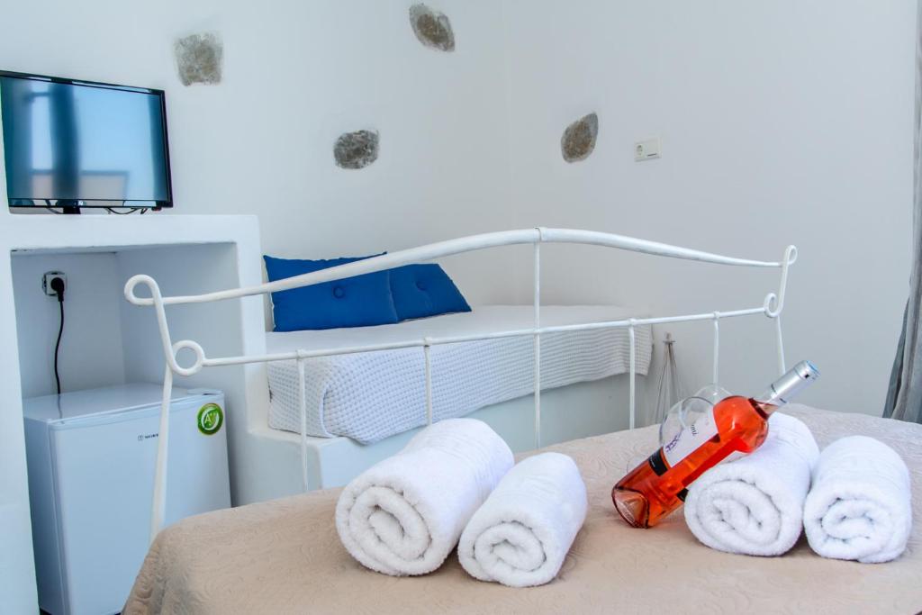 Postel nebo postele na pokoji v ubytování Cactus Beach Paros