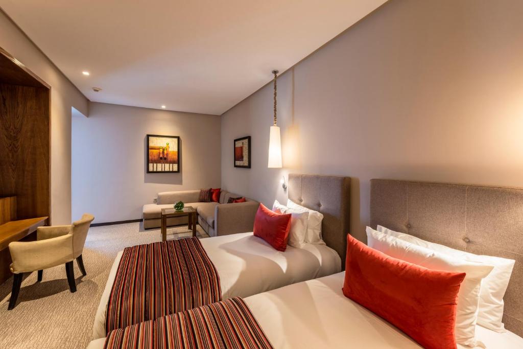 Postel nebo postele na pokoji v ubytování Dawliz Rabat Art & Spa