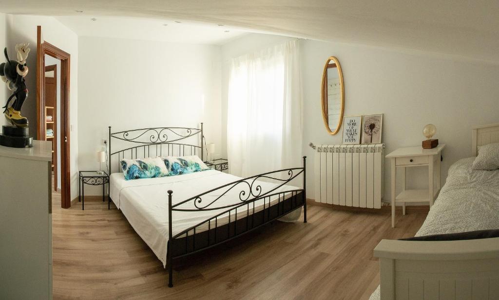 Postel nebo postele na pokoji v ubytování Casa Blanco Vista Maravillosa