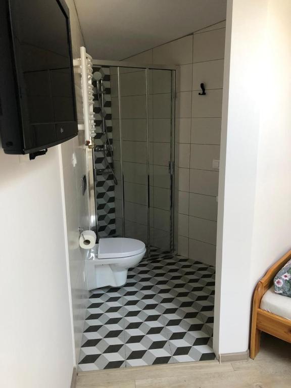Kúpeľňa v ubytovaní Gosciniec Pod Brzegiem
