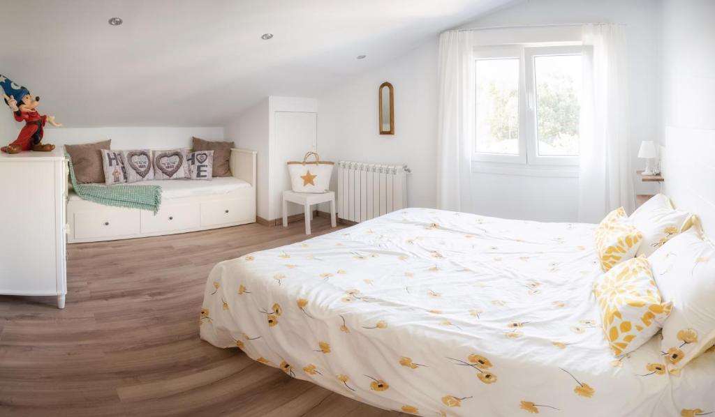 Postel nebo postele na pokoji v ubytování Casa Blanco Vista Maravillosa