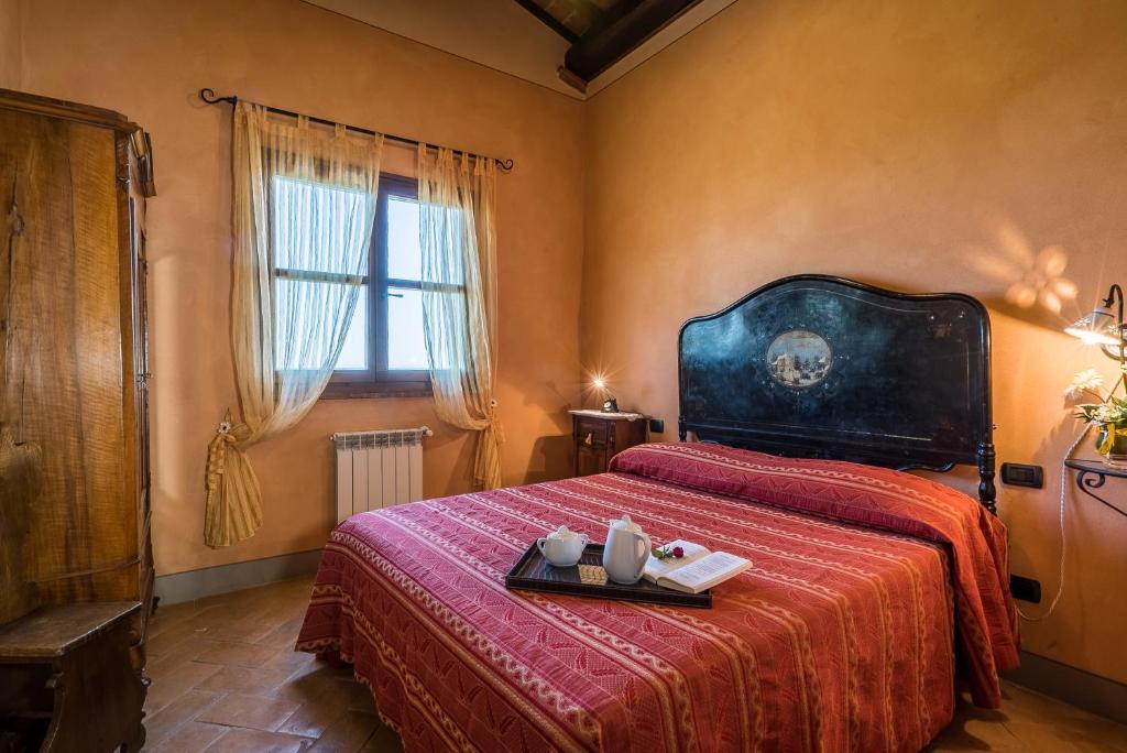 Posteľ alebo postele v izbe v ubytovaní Agriturismo I Colli