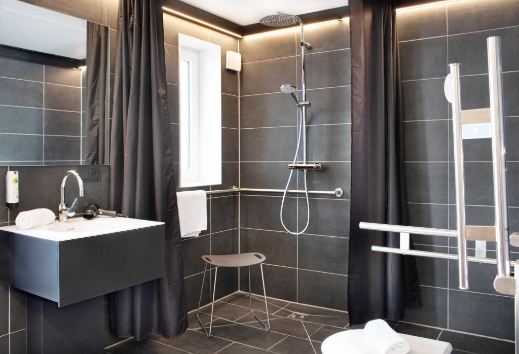 Koupelna v ubytování AU Hotel by WMM Hotels
