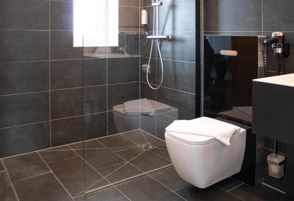 Koupelna v ubytování AU Hotel by WMM Hotels