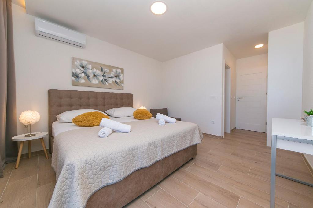 Postel nebo postele na pokoji v ubytování Brela: Villa Punta