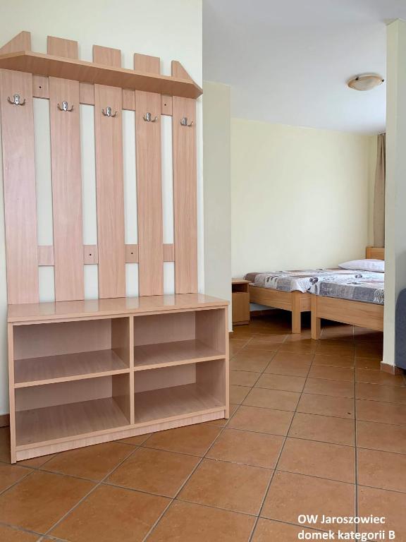 Postel nebo postele na pokoji v ubytování OW Jaroszowiec
