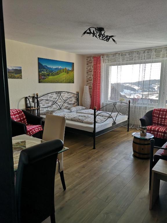 Postel nebo postele na pokoji v ubytování Ferienwohnung Ausblick