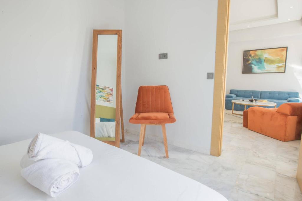 Postel nebo postele na pokoji v ubytování Stayhere Rabat - Agdal 2 - Classic Residence