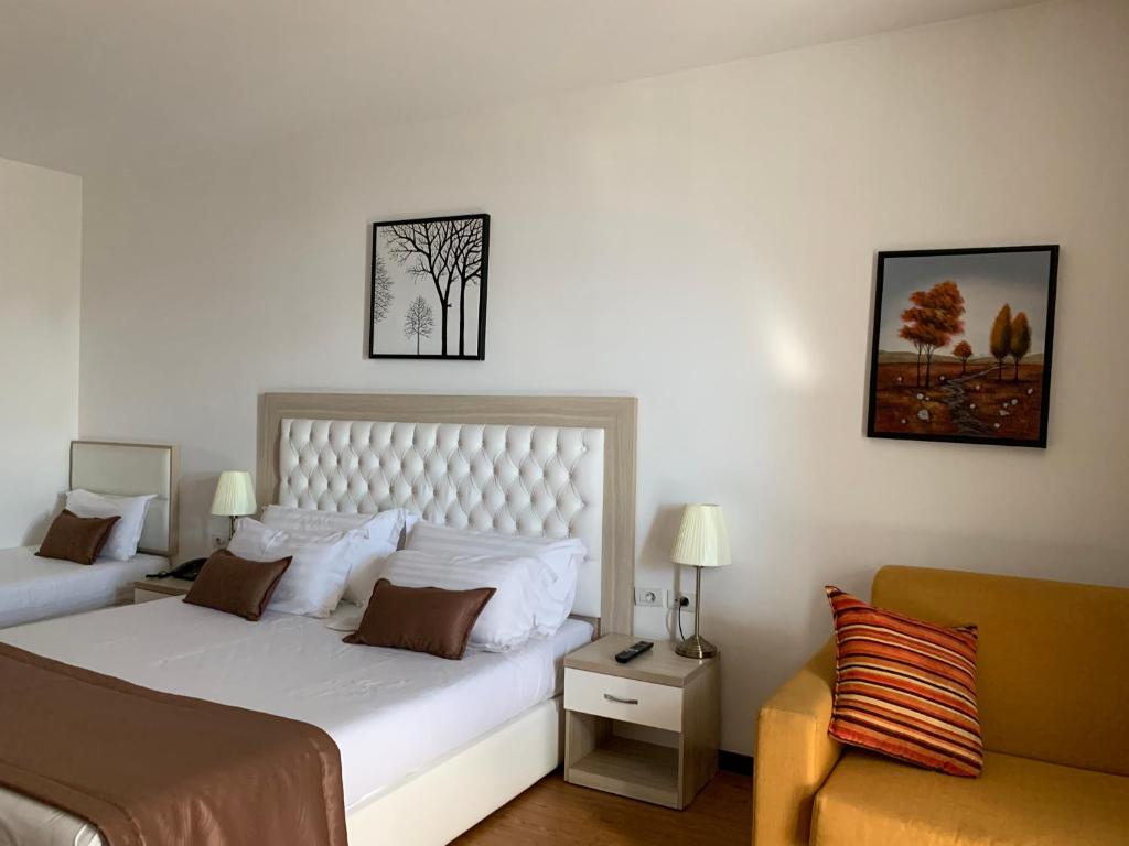 Postel nebo postele na pokoji v ubytování Hotel Bleart
