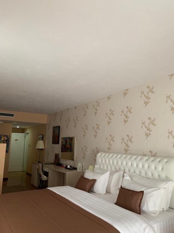 Postel nebo postele na pokoji v ubytování Hotel Bleart