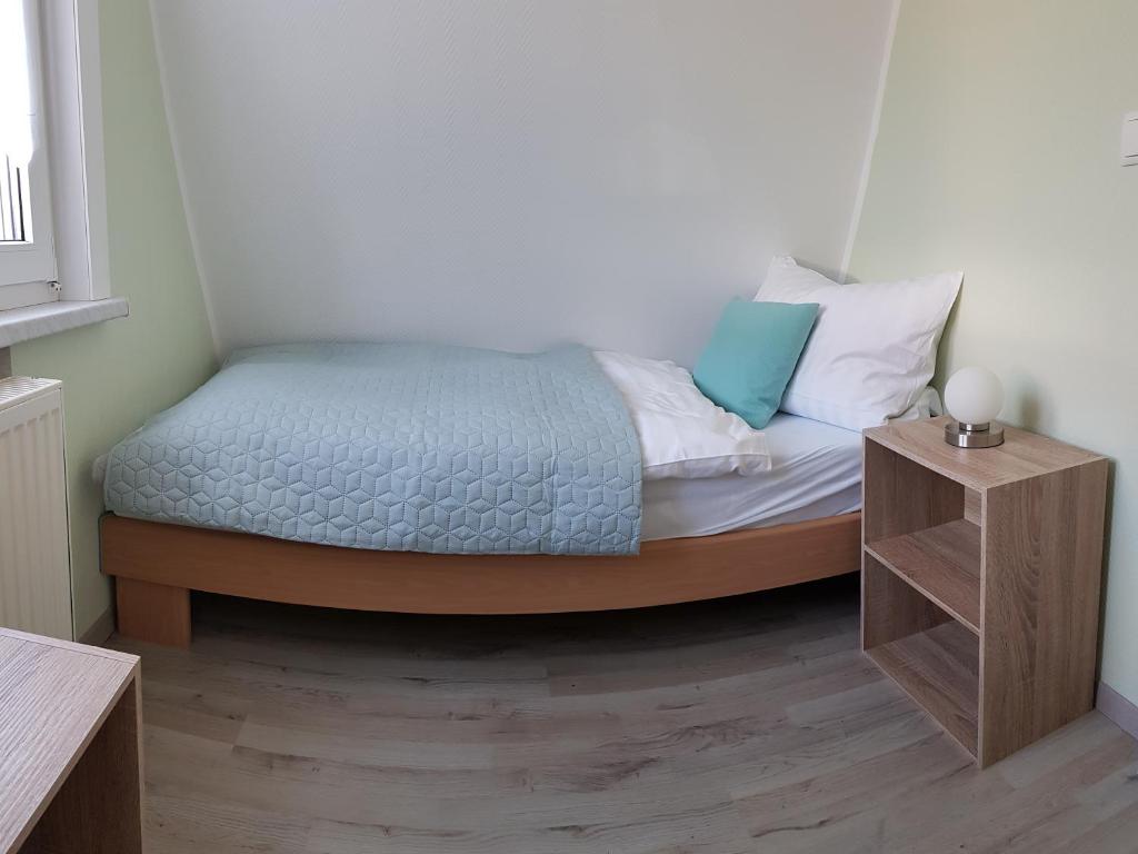 Postel nebo postele na pokoji v ubytování Harzer Finnhütte