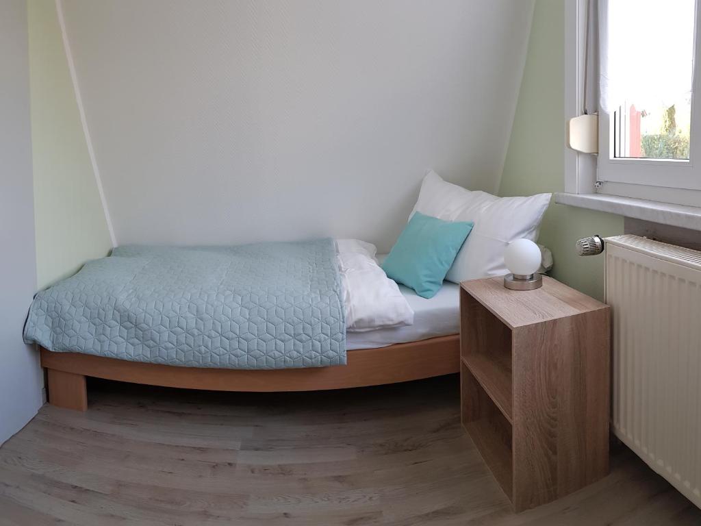 Postel nebo postele na pokoji v ubytování Harzer Finnhütte