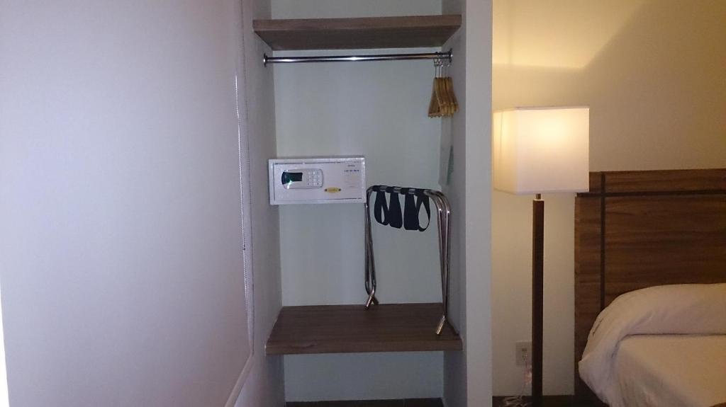 Postel nebo postele na pokoji v ubytování Hotel Oliver Inn - Business Class