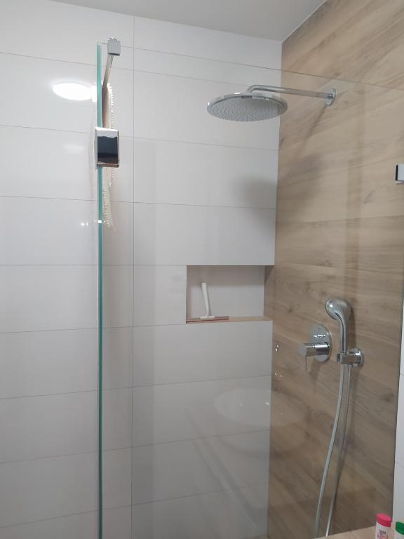 Kúpeľňa v ubytovaní Apartament z widokiem