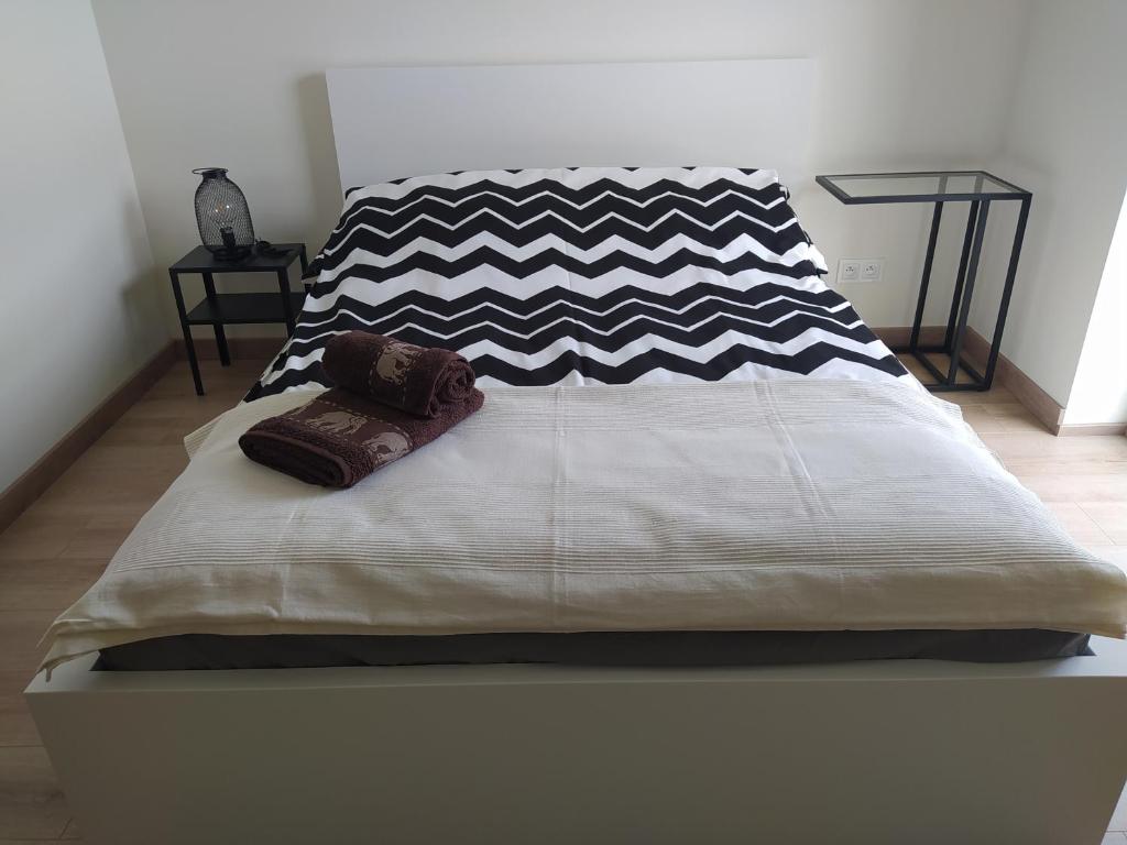 Posteľ alebo postele v izbe v ubytovaní Apartament z widokiem