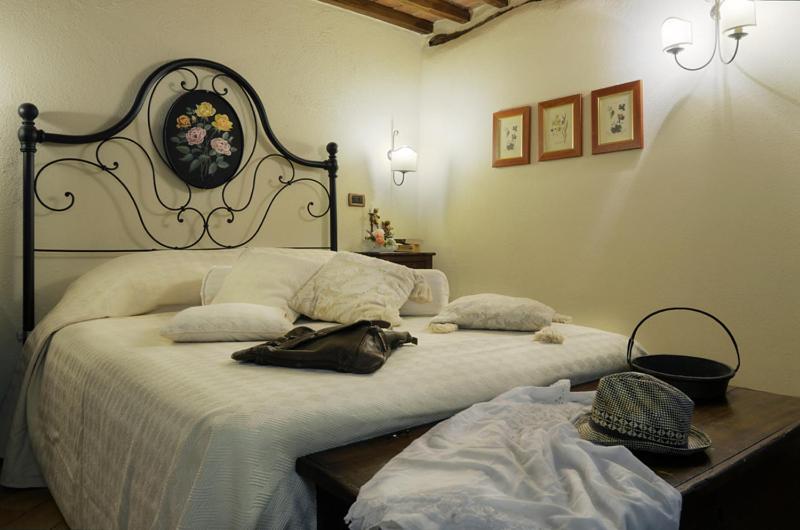 Posteľ alebo postele v izbe v ubytovaní Agriturismo La Casa Nuova