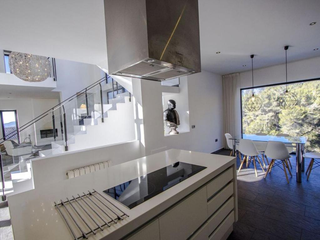 Posedenie v ubytovaní Architect modern design villa in Sitges Hills