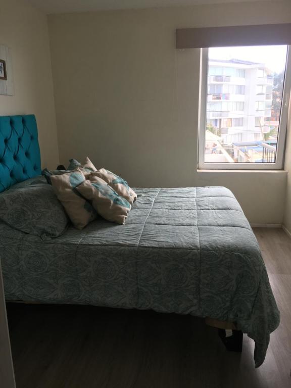 Postel nebo postele na pokoji v ubytování Departamento Playa Las Cadenas